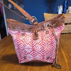 Lucky Brand Bali Hai sling bag in a red and white patterned canvas